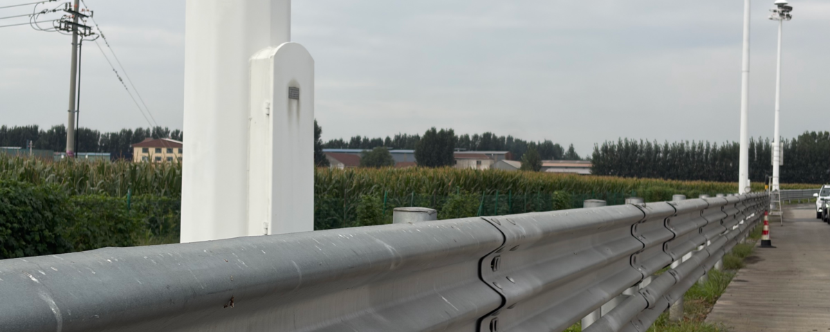 Galvanized steel guardrail installed along a roadway