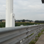 Galvanized steel guardrail installed along a roadway