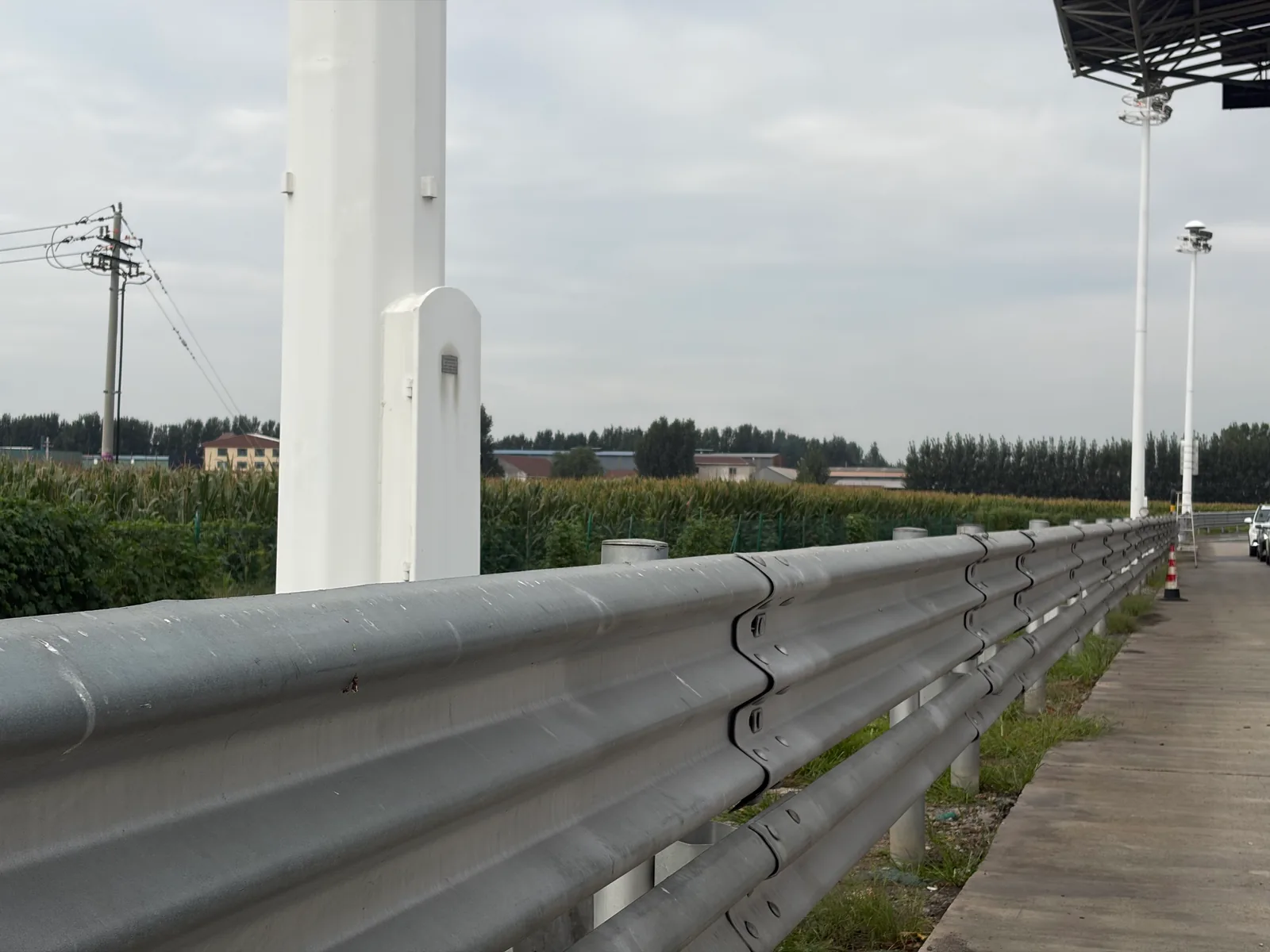 Galvanized steel guardrail installed along a roadway
