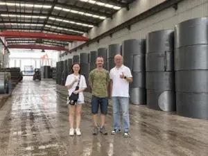 Algerian customer inspecting steel coils used for highway guardrail production with the China Guardrail team