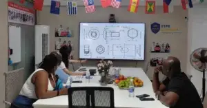 Ghanaian customer reviewing custom guardrail drawings with the China Guardrail team