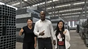 International customer visiting the highway guardrail manufacturing facility with the China Guardrail team