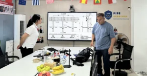 Mexican customer reviewing custom guardrail drawings with the China Guardrail team
